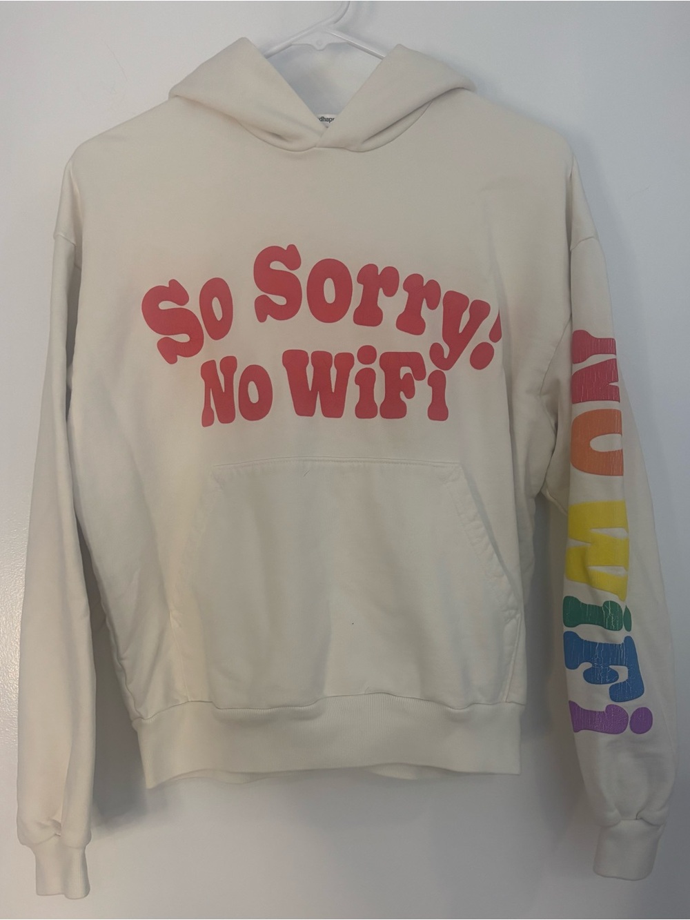Madhappy Cream Hoodie with Pink Graphic and Rainbow Sleeve
